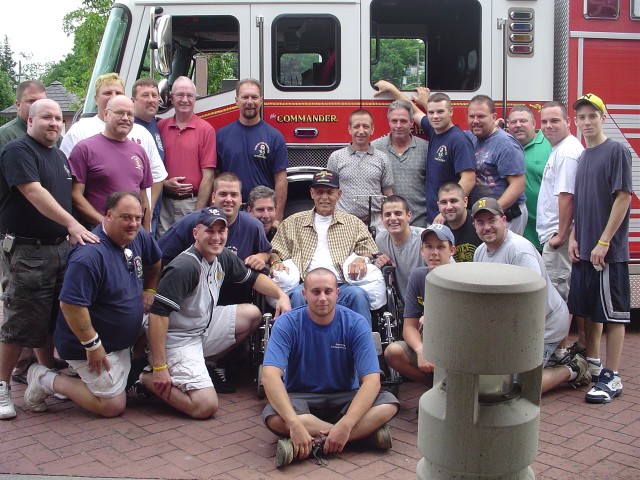 Company with Ex-Chief Ernie Giraudin posing in front of 8-EQ.  8-EQ was dedicated &quot;The Commander&quot; in honor of the Ex-Chief's service and dedication to the department.  7/7/05